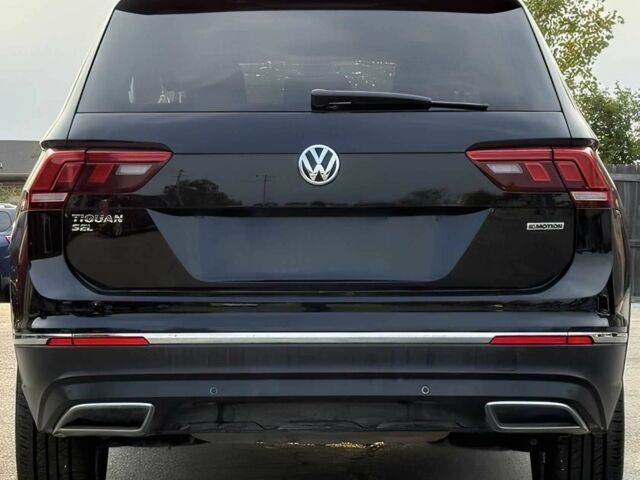 Чорний Фольксваген Тігуан, об'ємом двигуна 2 л та пробігом 34 тис. км за 11300 $, фото 4 на Automoto.ua