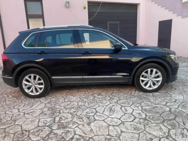 Черный Фольксваген Тигуан, объемом двигателя 2 л и пробегом 35 тыс. км за 17800 $, фото 6 на Automoto.ua