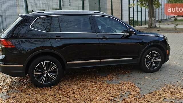 Чорний Фольксваген Тігуан, об'ємом двигуна 1.98 л та пробігом 314 тис. км за 15200 $, фото 8 на Automoto.ua