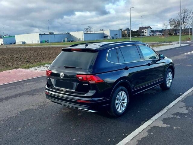 Черный Фольксваген Тигуан, объемом двигателя 2 л и пробегом 76 тыс. км за 9300 $, фото 2 на Automoto.ua