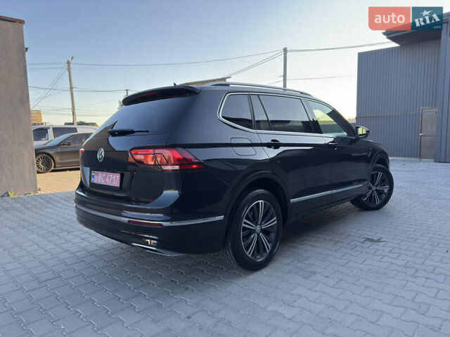 Черный Фольксваген Тигуан, объемом двигателя 2 л и пробегом 231 тыс. км за 16300 $, фото 5 на Automoto.ua