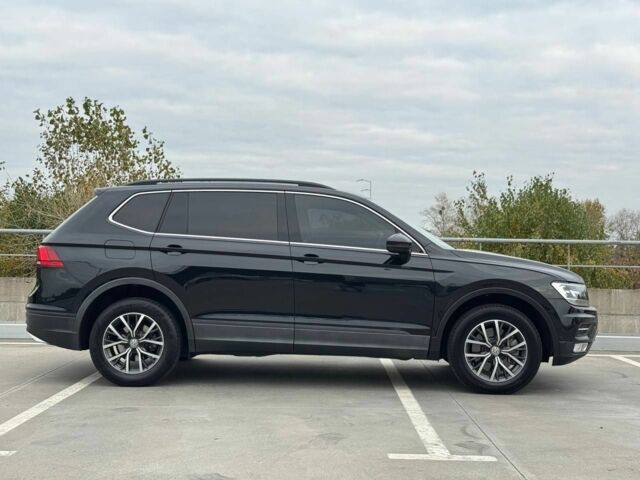 Чорний Фольксваген Тігуан, об'ємом двигуна 2 л та пробігом 117 тис. км за 19650 $, фото 3 на Automoto.ua