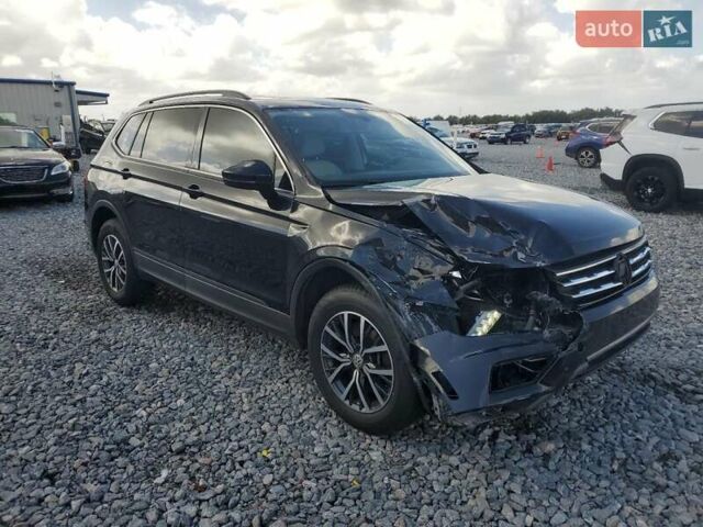 Черный Фольксваген Тигуан, объемом двигателя 2 л и пробегом 138 тыс. км за 12490 $, фото 3 на Automoto.ua