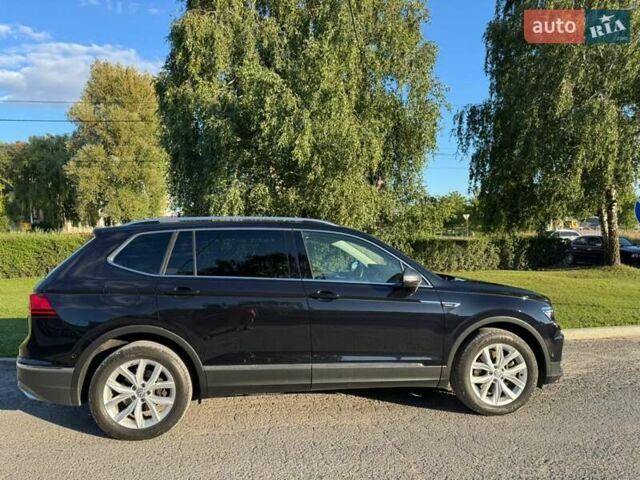 Чорний Фольксваген Тігуан, об'ємом двигуна 2 л та пробігом 223 тис. км за 27799 $, фото 3 на Automoto.ua