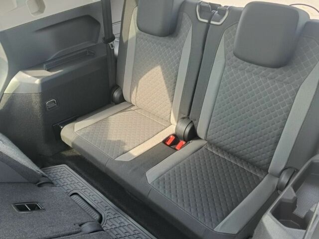 Чорний Фольксваген Тігуан, об'ємом двигуна 2 л та пробігом 130 тис. км за 16500 $, фото 4 на Automoto.ua