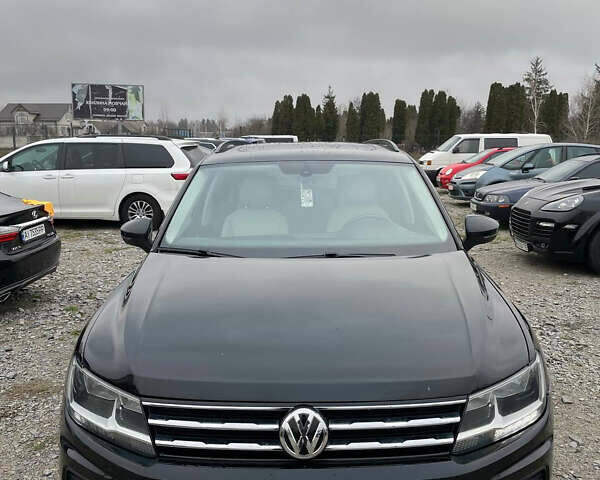 Черный Фольксваген Тигуан, объемом двигателя 2 л и пробегом 183 тыс. км за 19600 $, фото 1 на Automoto.ua