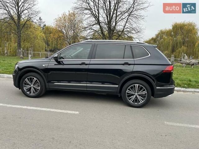Чорний Фольксваген Тігуан, об'ємом двигуна 2 л та пробігом 124 тис. км за 19500 $, фото 99 на Automoto.ua