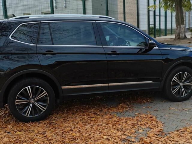 Черный Фольксваген Тигуан, объемом двигателя 2 л и пробегом 314 тыс. км за 14700 $, фото 7 на Automoto.ua