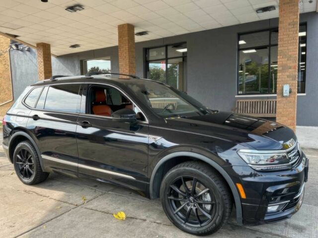 Чорний Фольксваген Тігуан, об'ємом двигуна 2 л та пробігом 43 тис. км за 12200 $, фото 2 на Automoto.ua