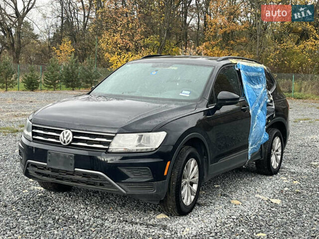 Черный Фольксваген Тигуан, объемом двигателя 2 л и пробегом 160 тыс. км за 12000 $, фото 1 на Automoto.ua