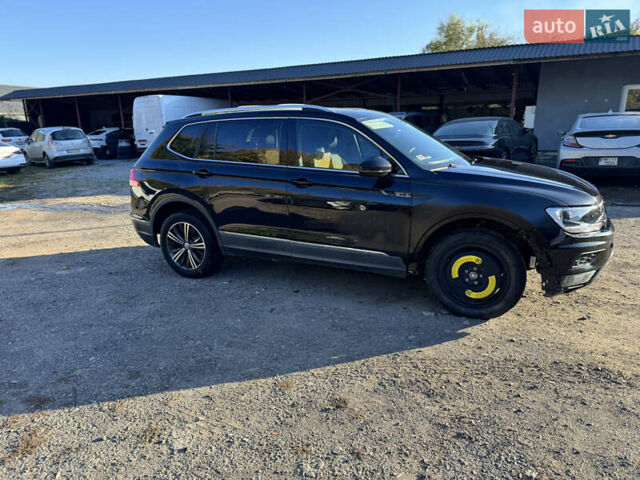Черный Фольксваген Тигуан, объемом двигателя 2 л и пробегом 133 тыс. км за 11900 $, фото 5 на Automoto.ua