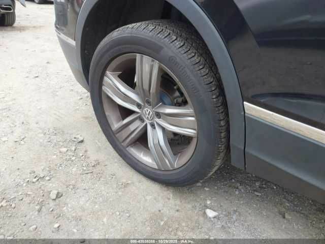 Черный Фольксваген Тигуан, объемом двигателя 2 л и пробегом 67 тыс. км за 5000 $, фото 18 на Automoto.ua