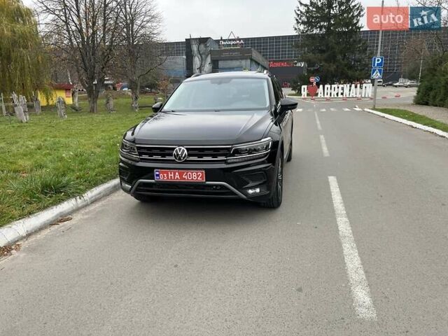 Чорний Фольксваген Тігуан, об'ємом двигуна 2 л та пробігом 124 тис. км за 19500 $, фото 87 на Automoto.ua