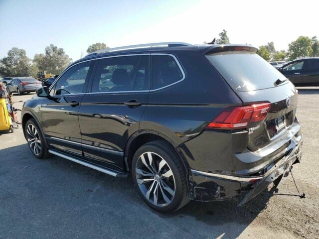 Чорний Фольксваген Тігуан, об'ємом двигуна 2 л та пробігом 65 тис. км за 6800 $, фото 1 на Automoto.ua