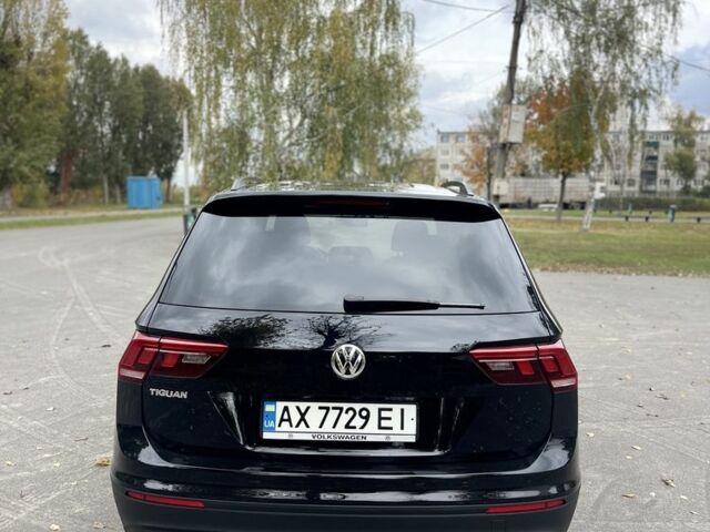 Черный Фольксваген Тигуан, объемом двигателя 2 л и пробегом 129 тыс. км за 19000 $, фото 4 на Automoto.ua