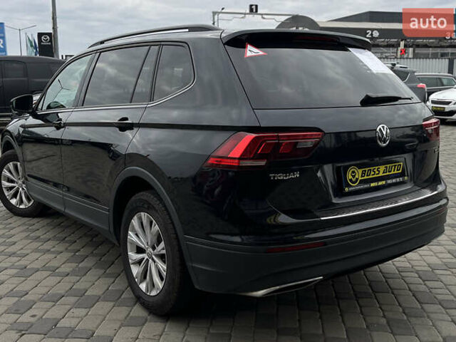 Черный Фольксваген Тигуан, объемом двигателя 1.98 л и пробегом 272 тыс. км за 16200 $, фото 4 на Automoto.ua