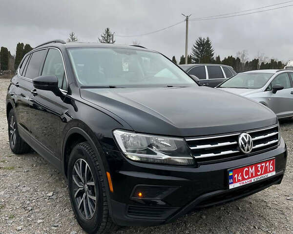 Черный Фольксваген Тигуан, объемом двигателя 2 л и пробегом 183 тыс. км за 19600 $, фото 2 на Automoto.ua