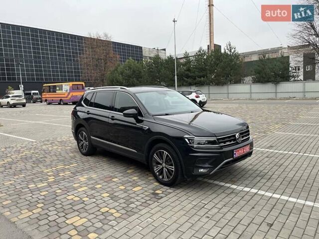 Чорний Фольксваген Тігуан, об'ємом двигуна 2 л та пробігом 124 тис. км за 19500 $, фото 18 на Automoto.ua