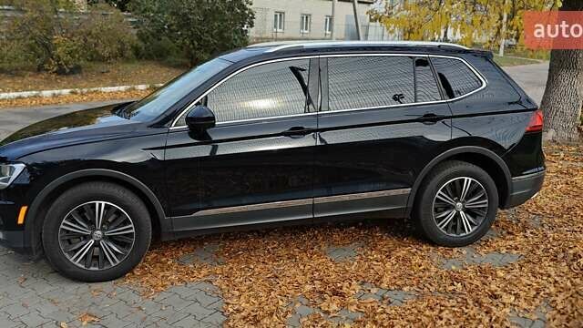 Чорний Фольксваген Тігуан, об'ємом двигуна 1.98 л та пробігом 314 тис. км за 15200 $, фото 5 на Automoto.ua