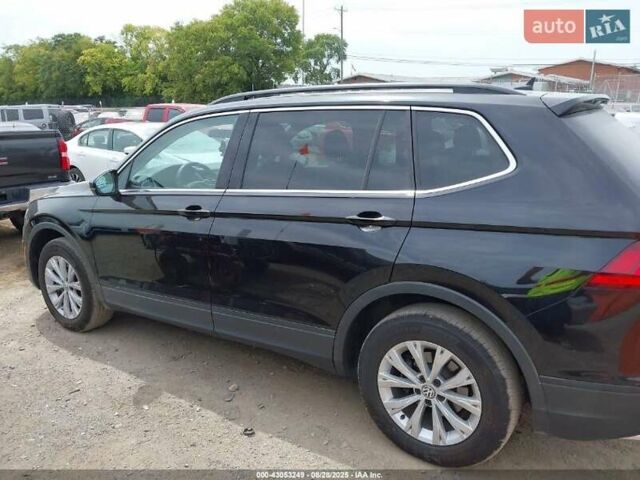 Чорний Фольксваген Тігуан, об'ємом двигуна 2 л та пробігом 187 тис. км за 16000 $, фото 4 на Automoto.ua