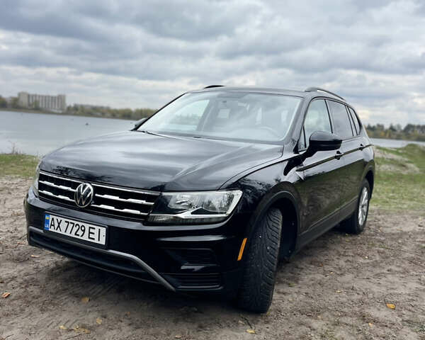Черный Фольксваген Тигуан, объемом двигателя 1.98 л и пробегом 129 тыс. км за 18500 $, фото 2 на Automoto.ua