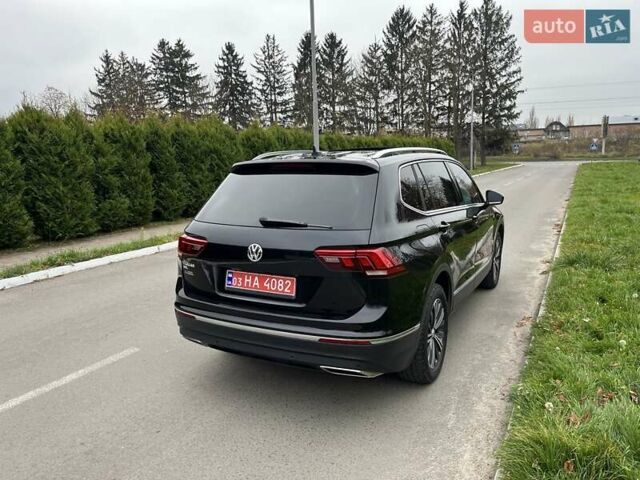 Чорний Фольксваген Тігуан, об'ємом двигуна 2 л та пробігом 124 тис. км за 19500 $, фото 78 на Automoto.ua