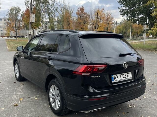 Черный Фольксваген Тигуан, объемом двигателя 2 л и пробегом 129 тыс. км за 19000 $, фото 5 на Automoto.ua