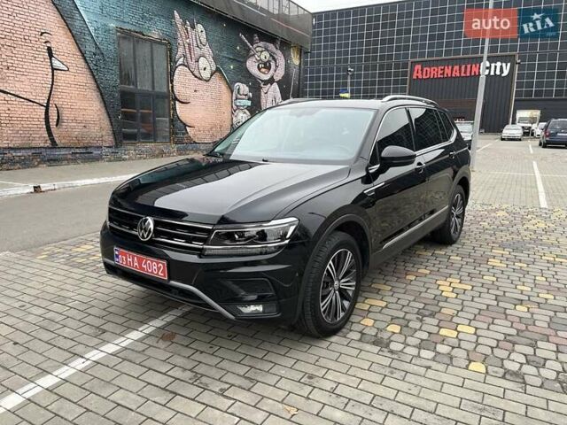 Чорний Фольксваген Тігуан, об'ємом двигуна 2 л та пробігом 124 тис. км за 19500 $, фото 26 на Automoto.ua