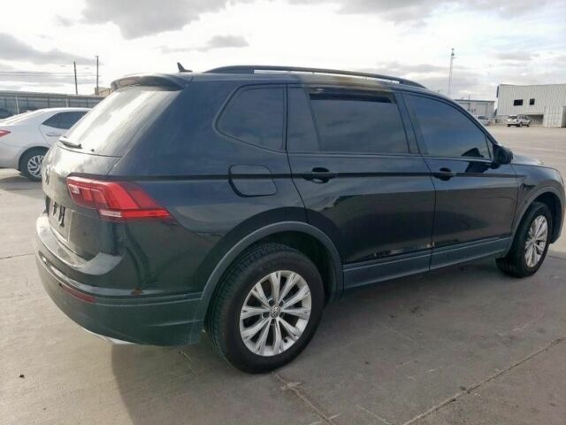 Черный Фольксваген Тигуан, объемом двигателя 0 л и пробегом 140 тыс. км за 12000 $, фото 2 на Automoto.ua