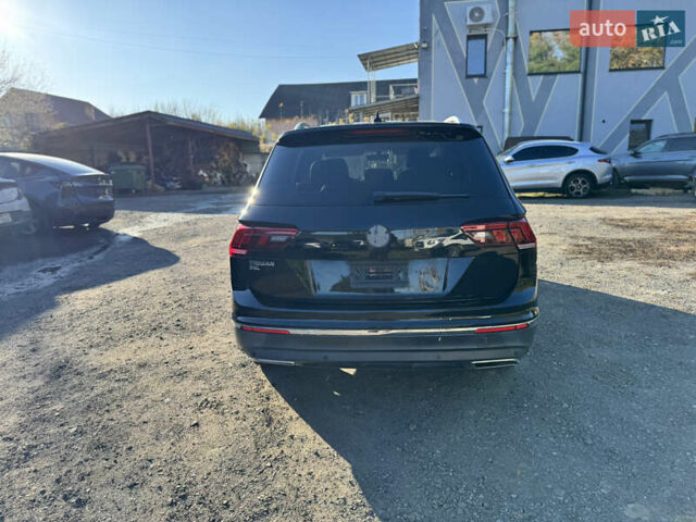 Черный Фольксваген Тигуан, объемом двигателя 2 л и пробегом 133 тыс. км за 11900 $, фото 9 на Automoto.ua