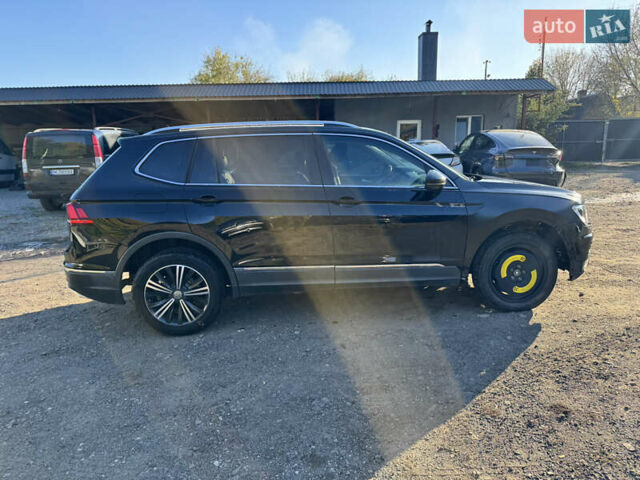 Черный Фольксваген Тигуан, объемом двигателя 2 л и пробегом 133 тыс. км за 11900 $, фото 6 на Automoto.ua