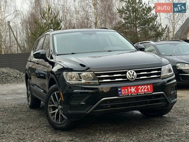 Чорний Фольксваген Тігуан, об'ємом двигуна 2 л та пробігом 200 тис. км за 15900 $, фото 1 на Automoto.ua