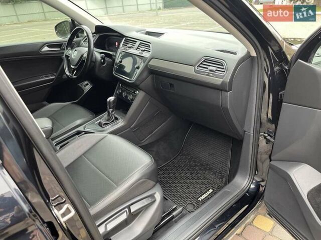 Чорний Фольксваген Тігуан, об'ємом двигуна 2 л та пробігом 124 тис. км за 19500 $, фото 51 на Automoto.ua