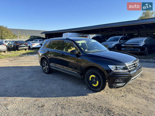 Черный Фольксваген Тигуан, объемом двигателя 2 л и пробегом 133 тыс. км за 11900 $, фото 4 на Automoto.ua