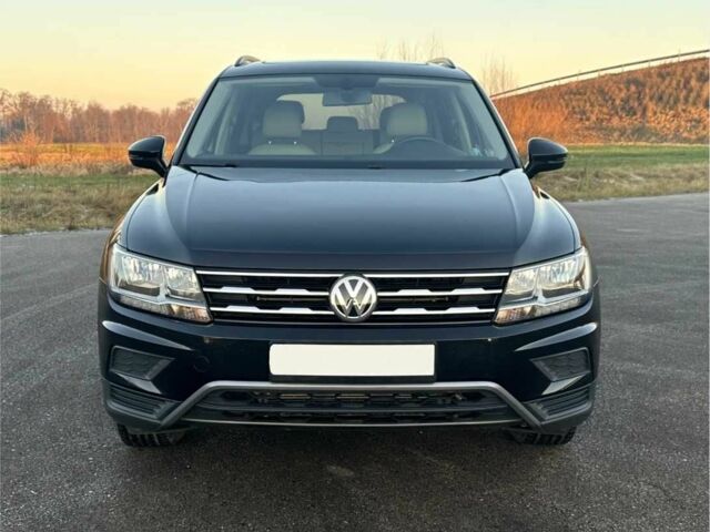 Черный Фольксваген Тигуан, объемом двигателя 2 л и пробегом 109 тыс. км за 11800 $, фото 1 на Automoto.ua