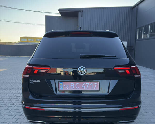 Черный Фольксваген Тигуан, объемом двигателя 2 л и пробегом 231 тыс. км за 16300 $, фото 3 на Automoto.ua