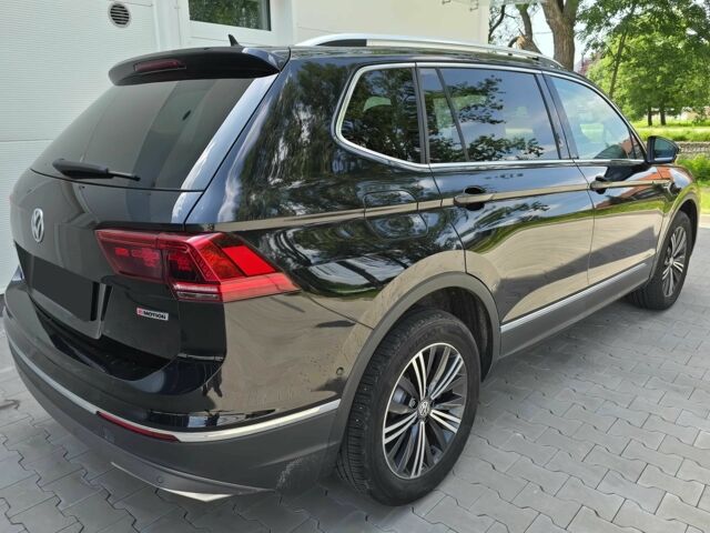 Чорний Фольксваген Тігуан, об'ємом двигуна 2 л та пробігом 41 тис. км за 13200 $, фото 4 на Automoto.ua