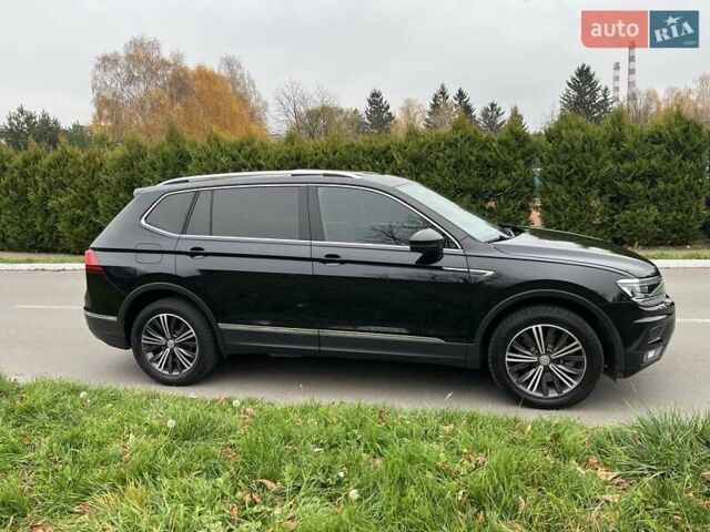 Чорний Фольксваген Тігуан, об'ємом двигуна 2 л та пробігом 124 тис. км за 19500 $, фото 92 на Automoto.ua