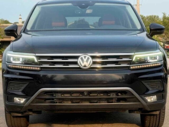 Черный Фольксваген Тигуан, объемом двигателя 2 л и пробегом 33 тыс. км за 8800 $, фото 1 на Automoto.ua