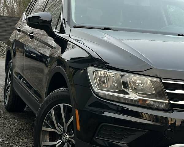 Чорний Фольксваген Тігуан, об'ємом двигуна 2 л та пробігом 200 тис. км за 15900 $, фото 7 на Automoto.ua