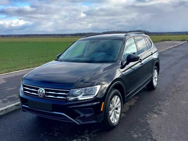 Черный Фольксваген Тигуан, объемом двигателя 2 л и пробегом 76 тыс. км за 9300 $, фото 1 на Automoto.ua