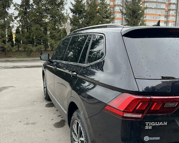 Черный Фольксваген Тигуан, объемом двигателя 2 л и пробегом 130 тыс. км за 18500 $, фото 6 на Automoto.ua