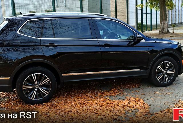 Черный Фольксваген Тигуан, объемом двигателя 2 л и пробегом 314 тыс. км за 15200 $, фото 5 на Automoto.ua