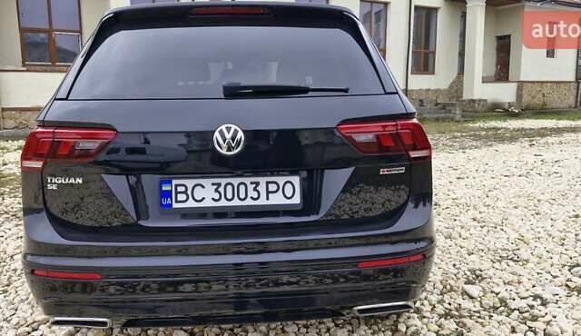 Черный Фольксваген Тигуан, объемом двигателя 2 л и пробегом 82 тыс. км за 21500 $, фото 2 на Automoto.ua