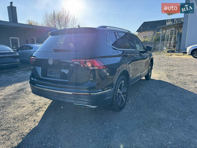 Черный Фольксваген Тигуан, объемом двигателя 2 л и пробегом 133 тыс. км за 11900 $, фото 8 на Automoto.ua