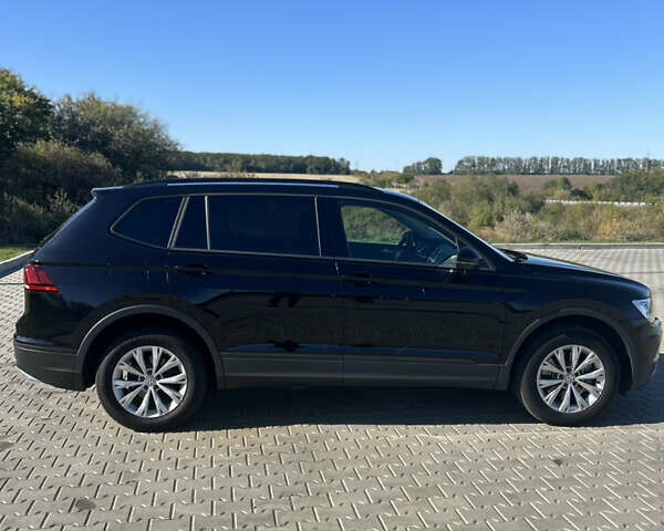 Чорний Фольксваген Тігуан, об'ємом двигуна 2 л та пробігом 76 тис. км за 18900 $, фото 6 на Automoto.ua