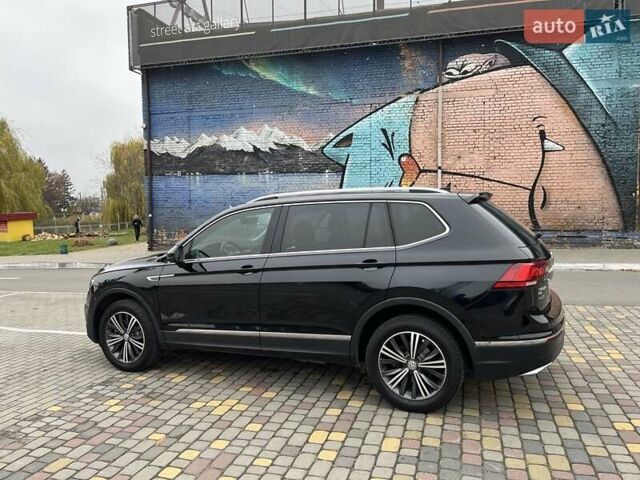 Чорний Фольксваген Тігуан, об'ємом двигуна 2 л та пробігом 124 тис. км за 19500 $, фото 4 на Automoto.ua