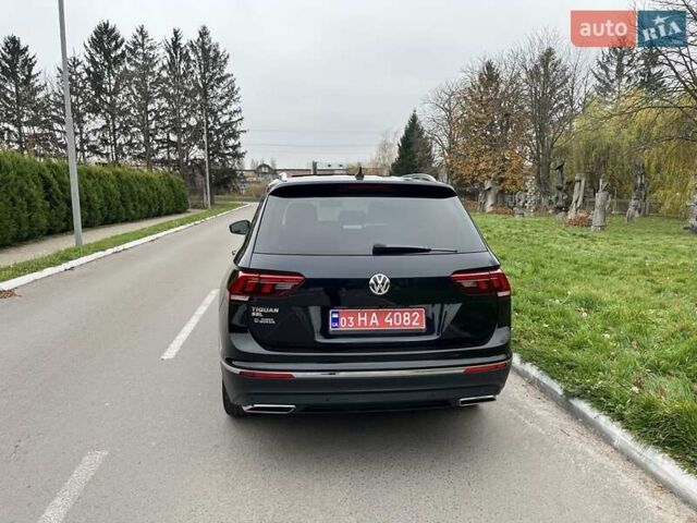 Чорний Фольксваген Тігуан, об'ємом двигуна 2 л та пробігом 124 тис. км за 19500 $, фото 74 на Automoto.ua