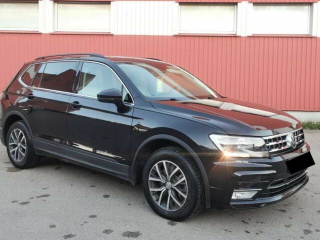 Черный Фольксваген Тигуан, объемом двигателя 2 л и пробегом 78 тыс. км за 14900 $, фото 1 на Automoto.ua