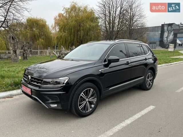 Чорний Фольксваген Тігуан, об'ємом двигуна 2 л та пробігом 124 тис. км за 19500 $, фото 68 на Automoto.ua